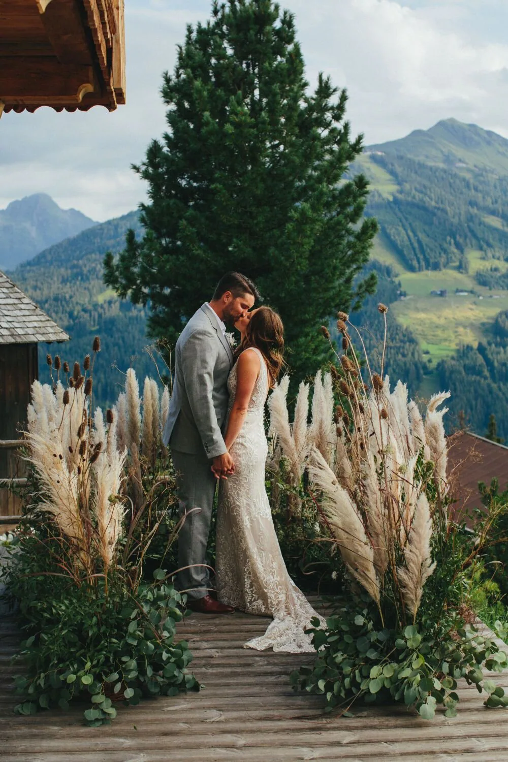 Tying the knot on top of the mountain in the Austrian Alps at Bischoferalm, Alpbach, Austria