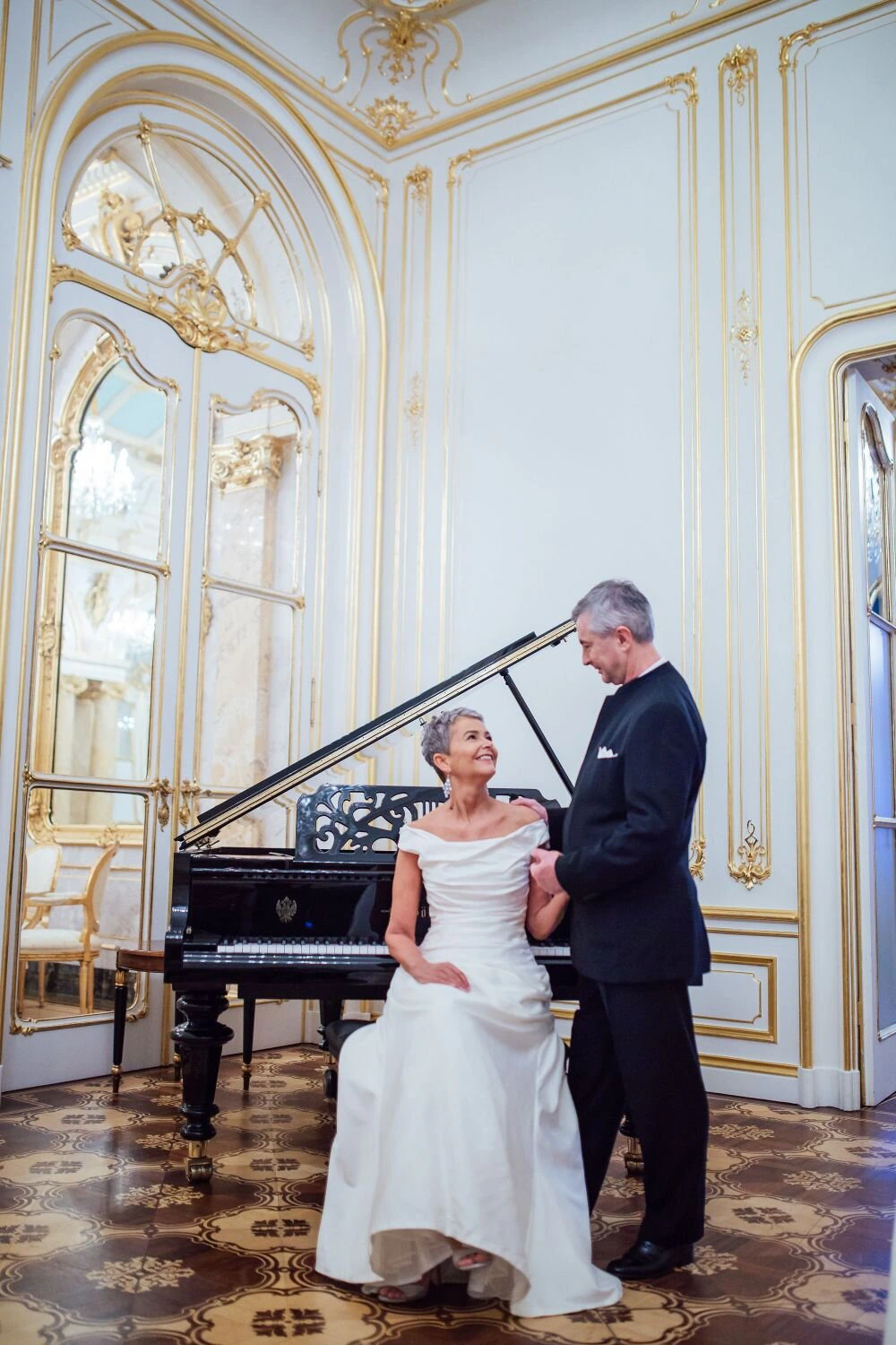 The love of music brought this beautiful British couple to Vienna Austria for their New Year’s palace destination wedding at Palais Coburg, Vienna, Austria